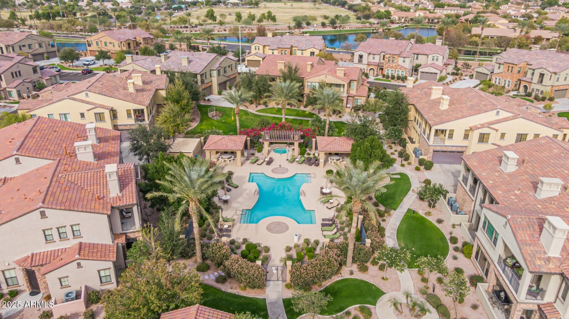 4777 South Fulton Ranch Boulevard, Unit 1027 Chandler, AZ 85248 - Photo 37 of 50 an aerial view of residential houses with outdoor space