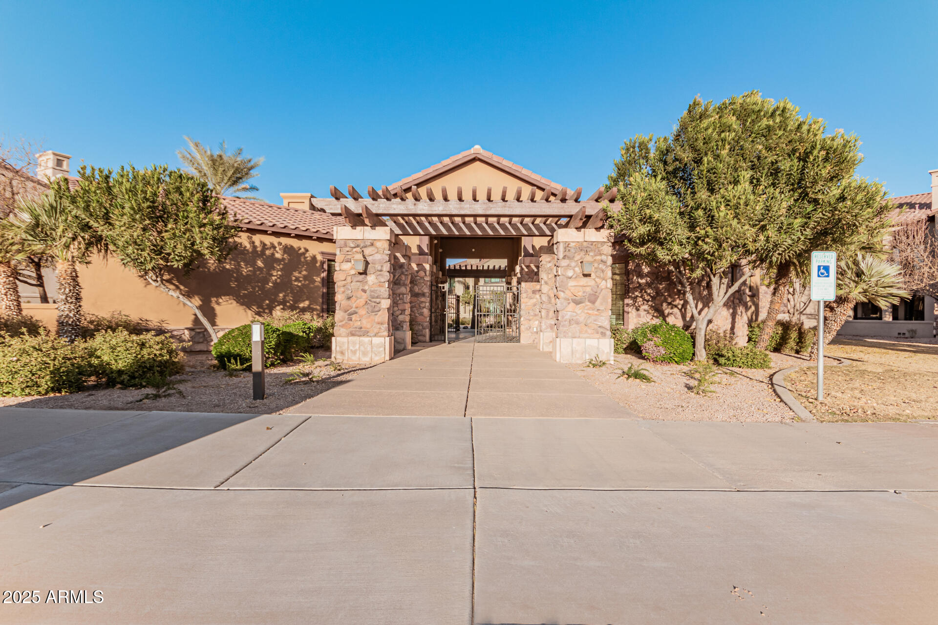 4777 South Fulton Ranch Boulevard, Unit 1027 Chandler, AZ 85248 - Photo 41 of 50 a view of a house with a street