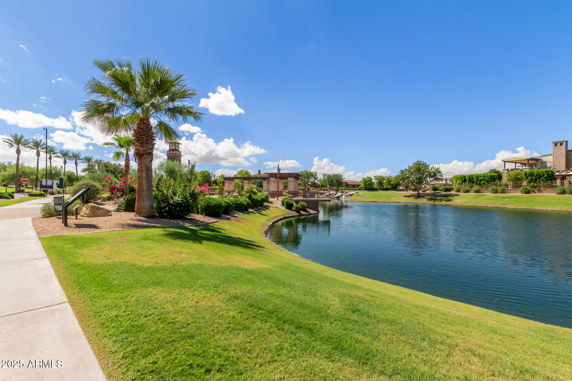 4777 South Fulton Ranch Boulevard, Unit 1027 Chandler, AZ 85248 - Photo 42 of 50 a view of a swimming pool with a lake view