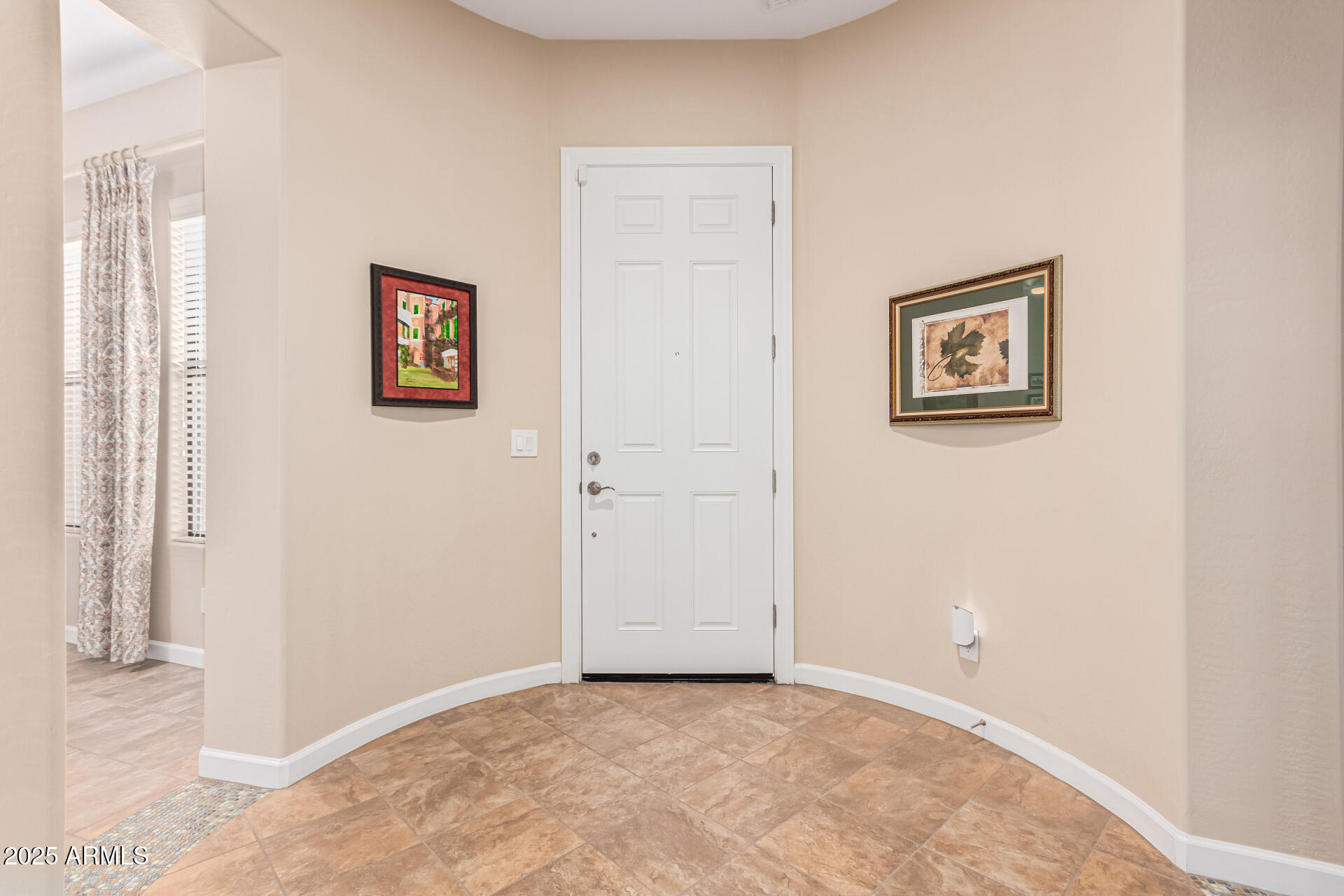 4777 South Fulton Ranch Boulevard, Unit 1027 Chandler, AZ 85248 - Photo 7 of 50 an empty room with wall painting and a window