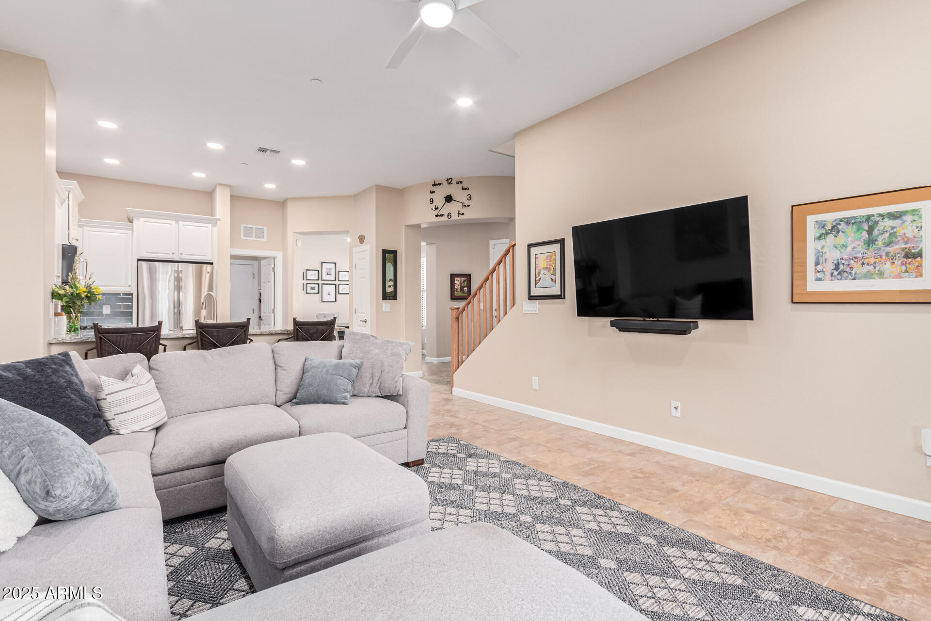 4777 South Fulton Ranch Boulevard, Unit 1027 Chandler, AZ 85248 - Photo 9 of 50 a living room with furniture and a flat screen tv