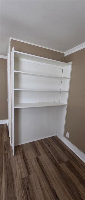 7043 South Goddard Road Stonecrest, GA 30038 - Photo 18 of 33 a view of storage and utility room with wooden floor