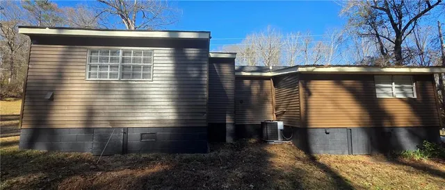 a view of a backyard of a house