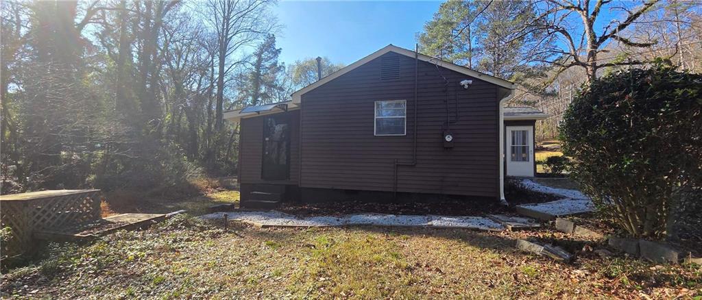 7043 South Goddard Road Stonecrest, GA 30038 - Photo 28 of 33 a view of a backyard of a house
