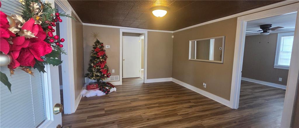7043 South Goddard Road Stonecrest, GA 30038 - Photo 8 of 33 wooden floor in a gallery with a potted plant