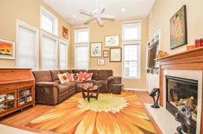 65 High Point Circle Rye Brook, NY 10573 - Photo 1 of 1 a living room with furniture large window and fireplace