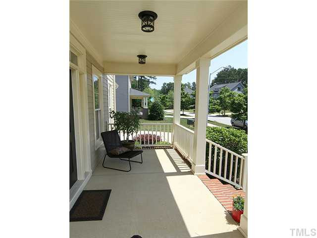 108 Redhill Road Holly Springs, NC 27540 - Photo 3 of 25 Sit Back And Relax on the Covered Front Porch Porch