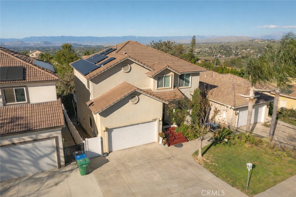 14464 Dove Canyon Drive Riverside, CA 92503 - Photo 1 of 25 an aerial view of a house with a garden