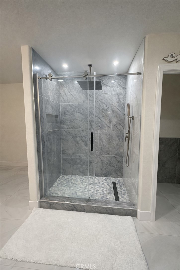 14464 Dove Canyon Drive Riverside, CA 92503 - Photo 14 of 25 a bathroom with a shower