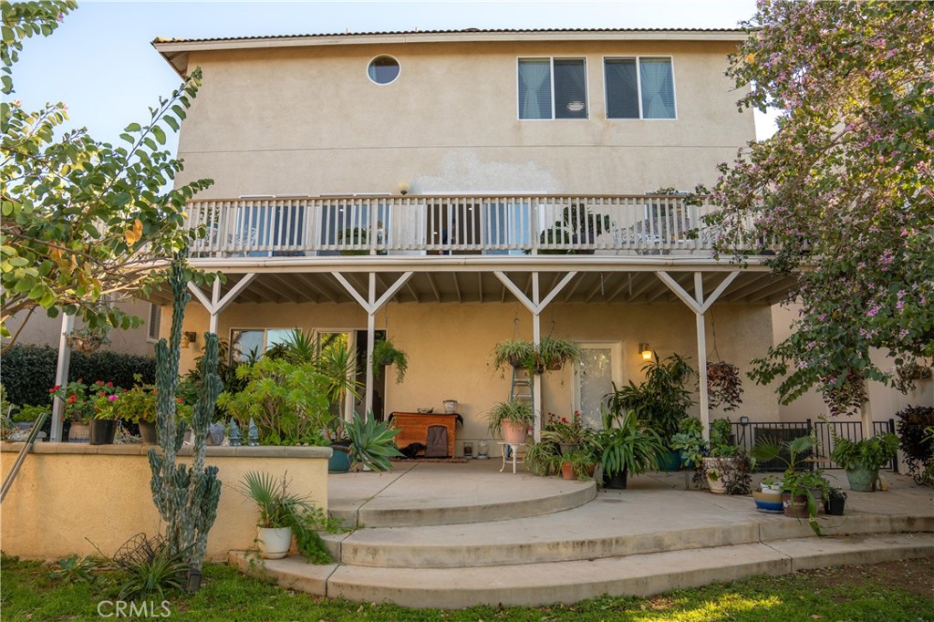 14464 Dove Canyon Drive Riverside, CA 92503 - Photo 22 of 25 a view of a house with a yard and plants
