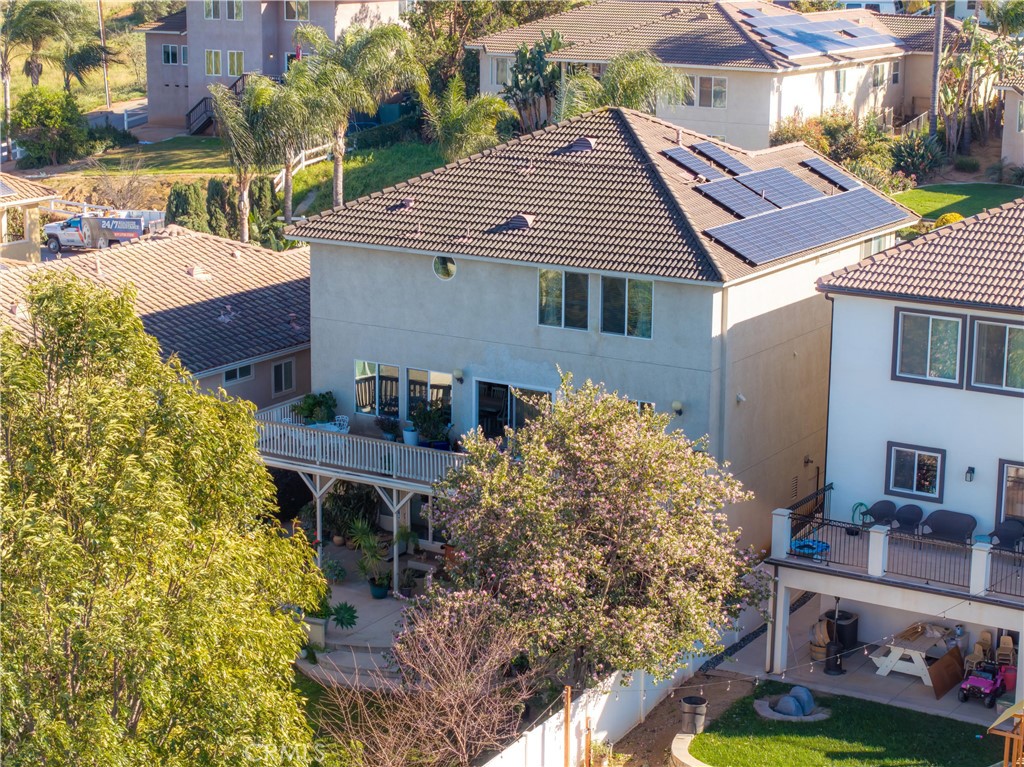 14464 Dove Canyon Drive Riverside, CA 92503 - Photo 24 of 25 front view of a house with a small yard and potted plants