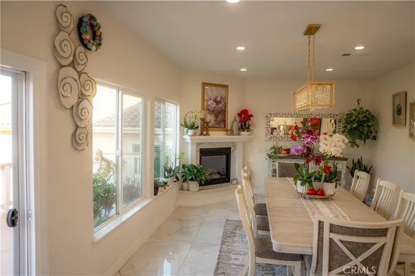 a view of a dining room with furniture window and outside view