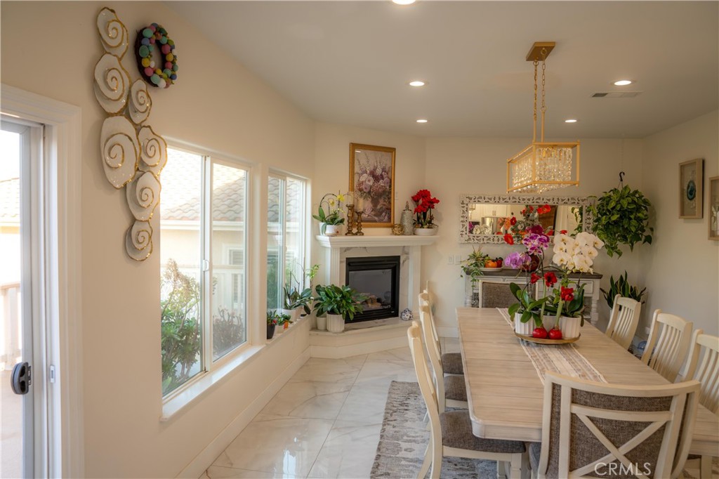 14464 Dove Canyon Drive Riverside, CA 92503 - Photo 6 of 25 a view of a dining room with furniture window and outside view