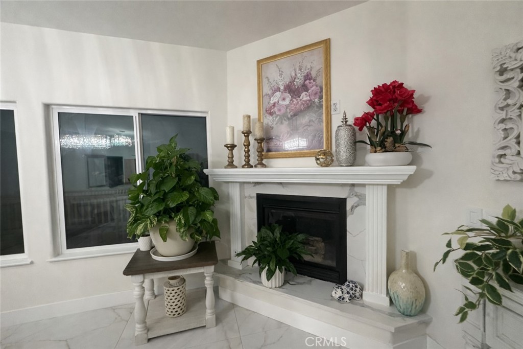 14464 Dove Canyon Drive Riverside, CA 92503 - Photo 9 of 25 a living room with furniture and a potted plant