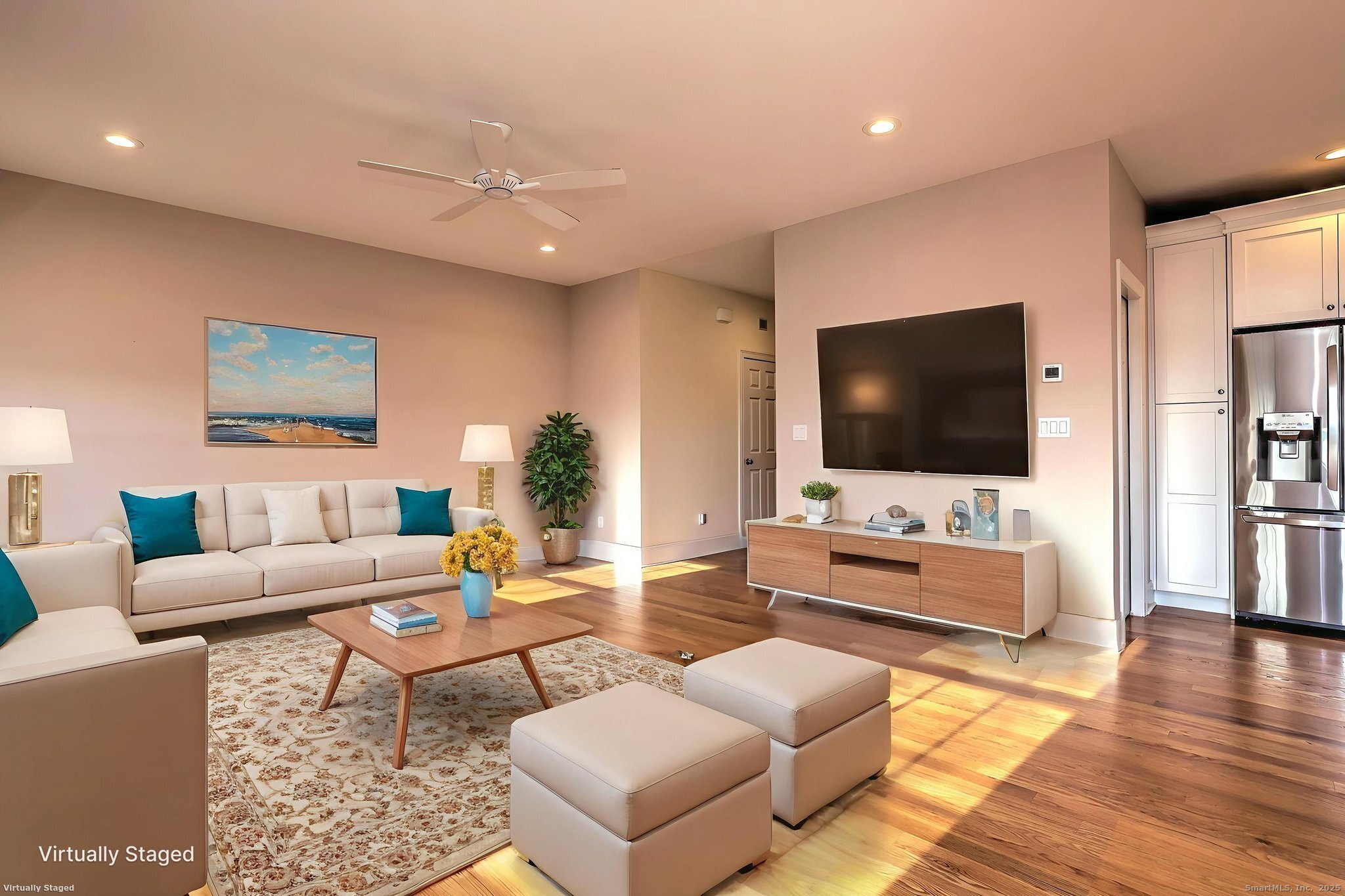 126 Wells View Road, Unit 126 Shelton, CT 06484 - Photo 12 of 26 a living room with furniture and a flat screen tv