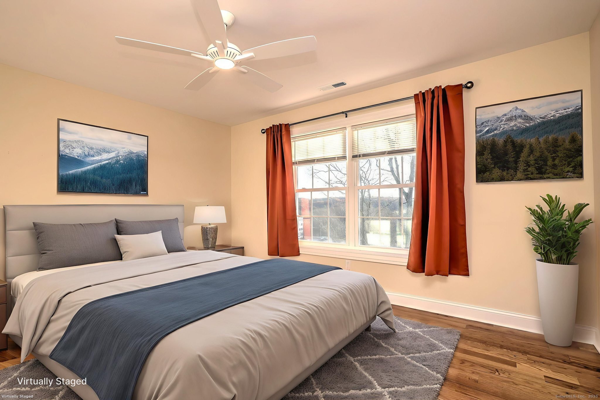 126 Wells View Road, Unit 126 Shelton, CT 06484 - Photo 24 of 26 a bedroom with a large bed and a large window