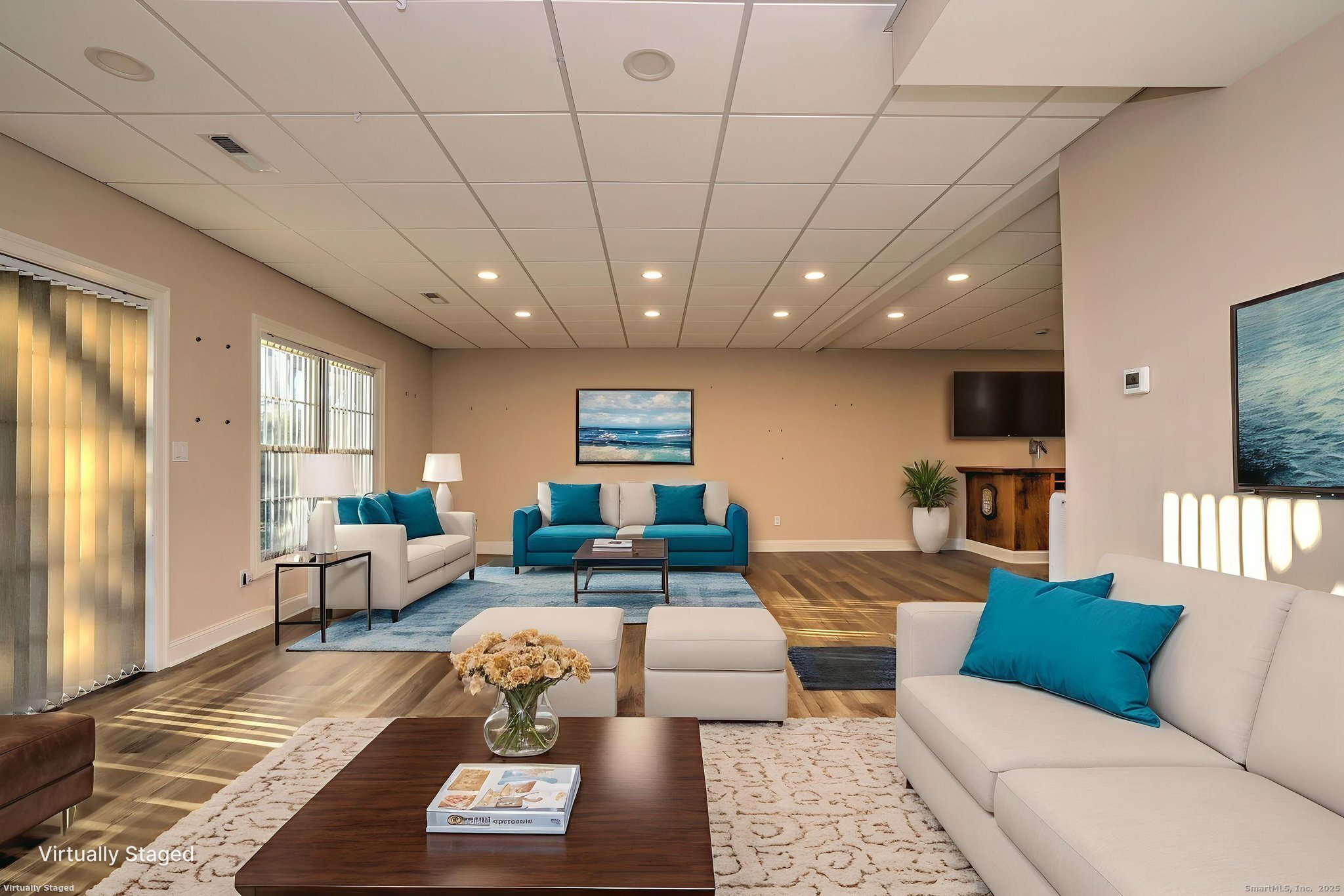 126 Wells View Road, Unit 126 Shelton, CT 06484 - Photo 26 of 26 a living room with furniture and a flat screen tv