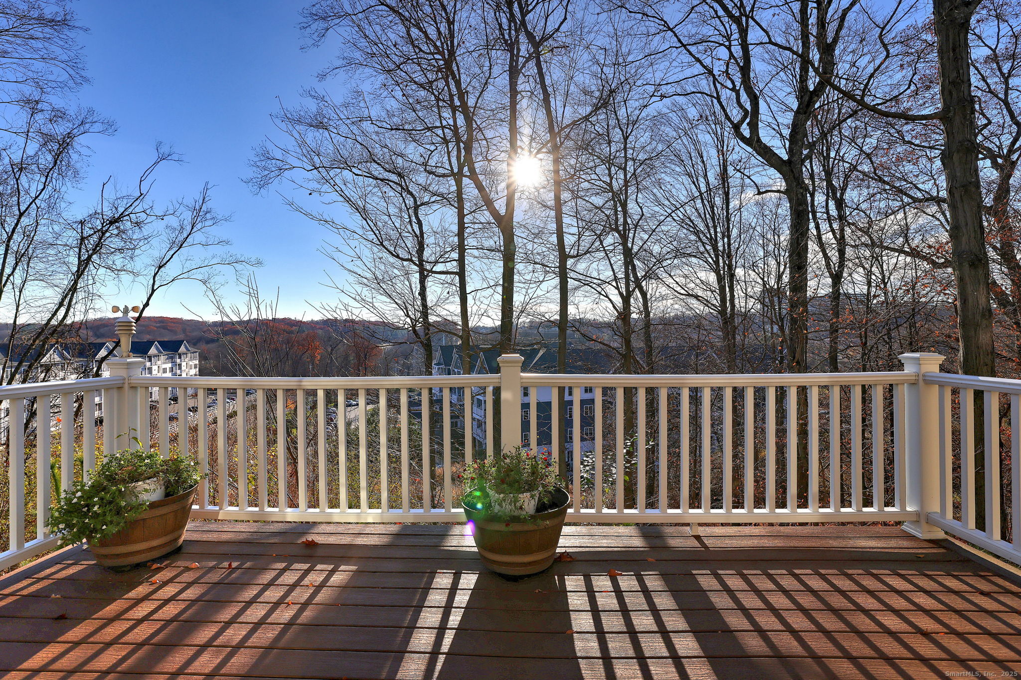 126 Wells View Road, Unit 126 Shelton, CT 06484 - Photo 5 of 26 a view of a chair on the roof deck