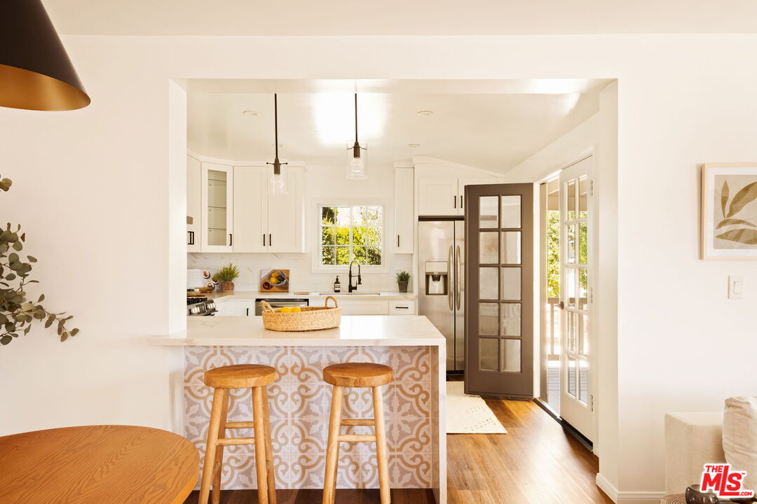 1275 North Craig Avenue Pasadena, CA 91104 - Photo 11 of 30 a view of kitchen with furniture and wooden floor