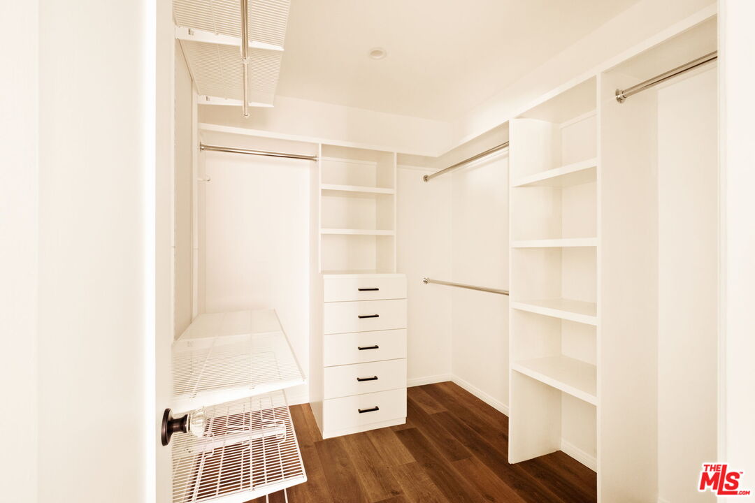 1275 North Craig Avenue Pasadena, CA 91104 - Photo 19 of 30 a view of walk in closet with empty racks