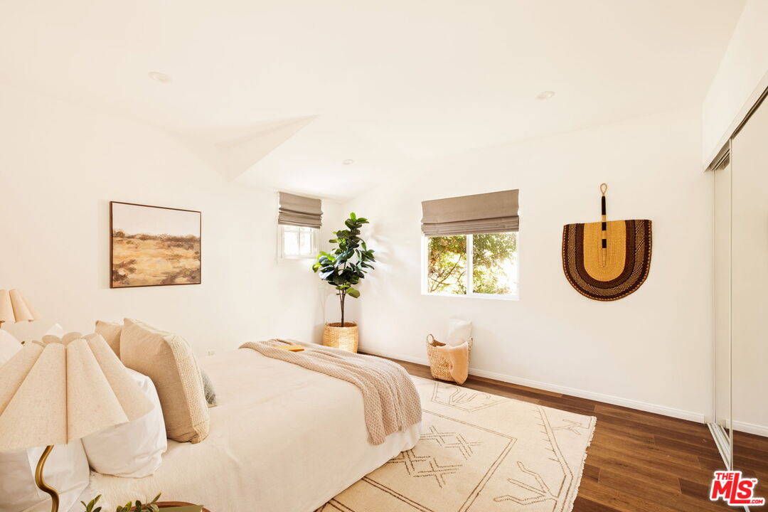 1275 North Craig Avenue Pasadena, CA 91104 - Photo 24 of 30 a bedroom with a bed and a window