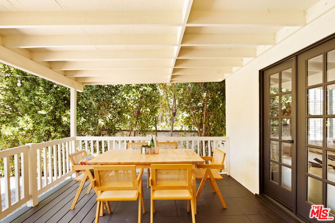 1275 North Craig Avenue Pasadena, CA 91104 - Photo 25 of 30 a view of a city from a dining room with large windows