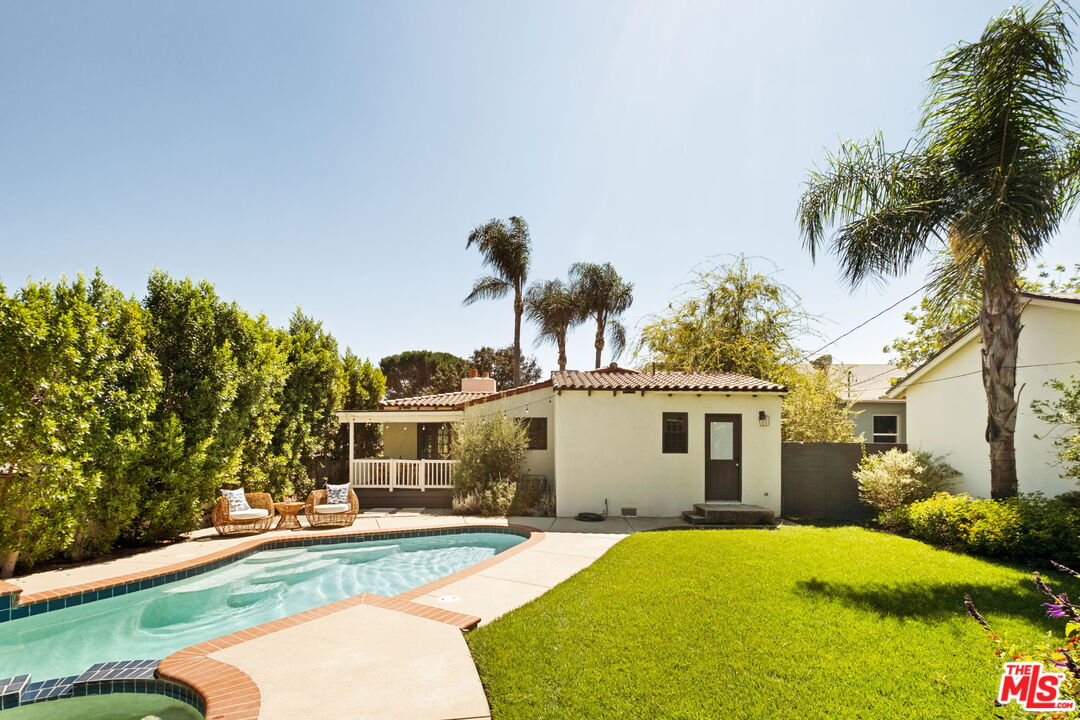 1275 North Craig Avenue Pasadena, CA 91104 - Photo 26 of 30 a house with palm tree in front of it