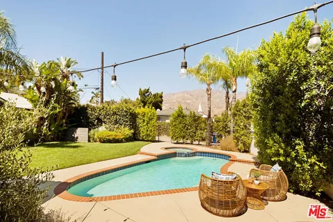 a view of a fountain in the yard