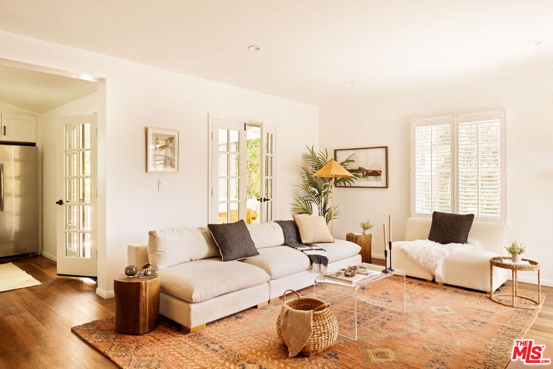 1275 North Craig Avenue Pasadena, CA 91104 - Photo 4 of 30 a living room with furniture and wooden floor