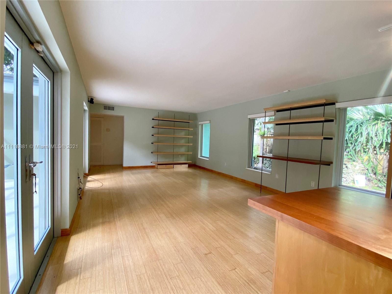 3620 Solana Road Miami, FL 33133 - Photo 8 of 23 a view of an empty room with a window