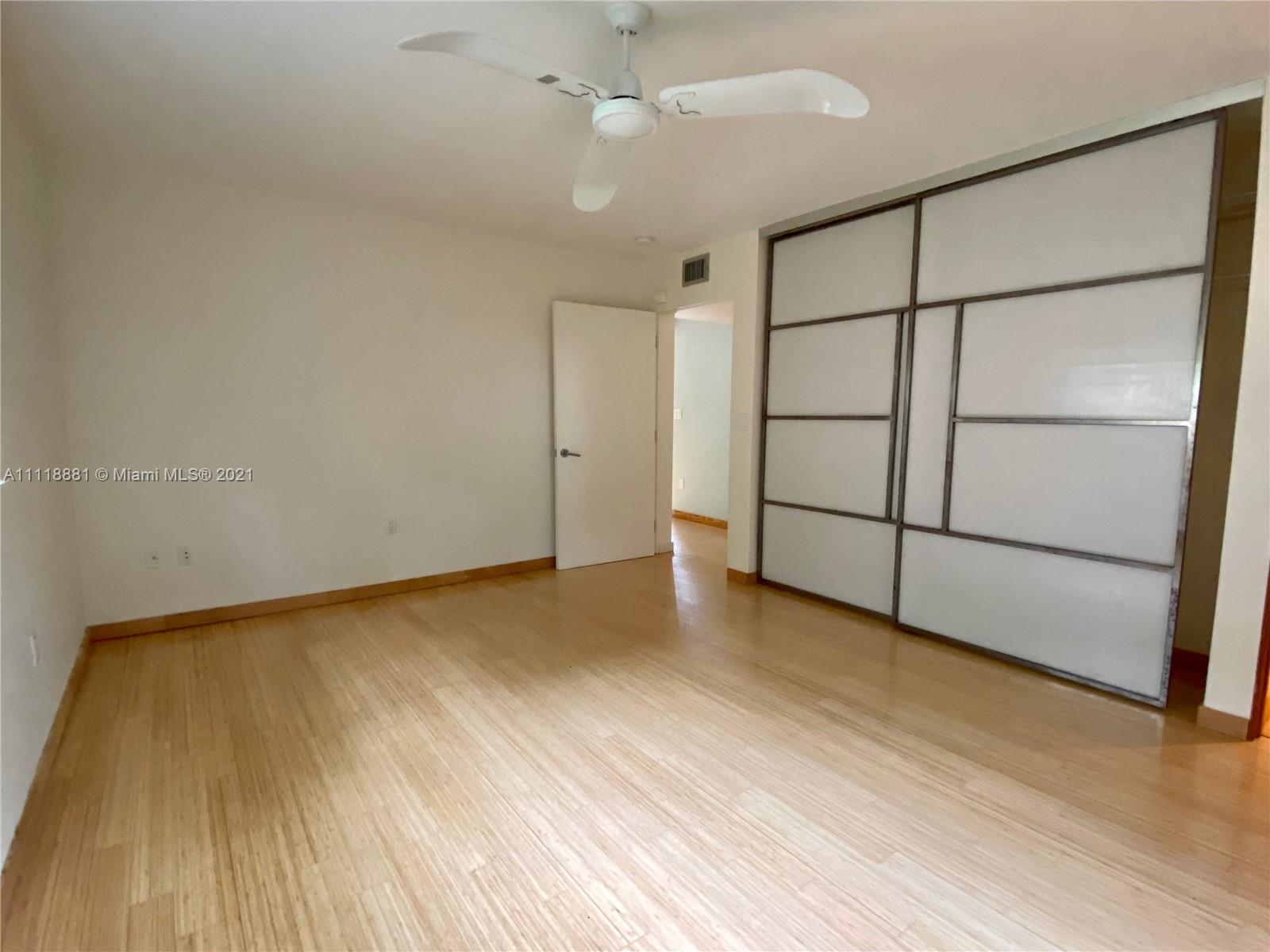 3620 Solana Road Miami, FL 33133 - Photo 10 of 23 a view of an empty room with a window