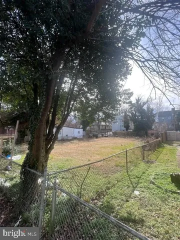 a view of yard with outdoor seating