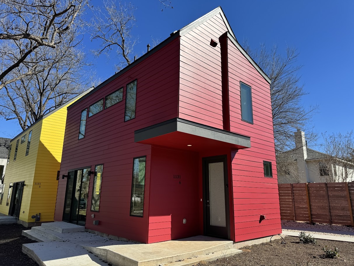 1131 Walton Lane, Unit 6 Austin, TX 78721 - Photo 1 of 16 a view of a house with a balcony