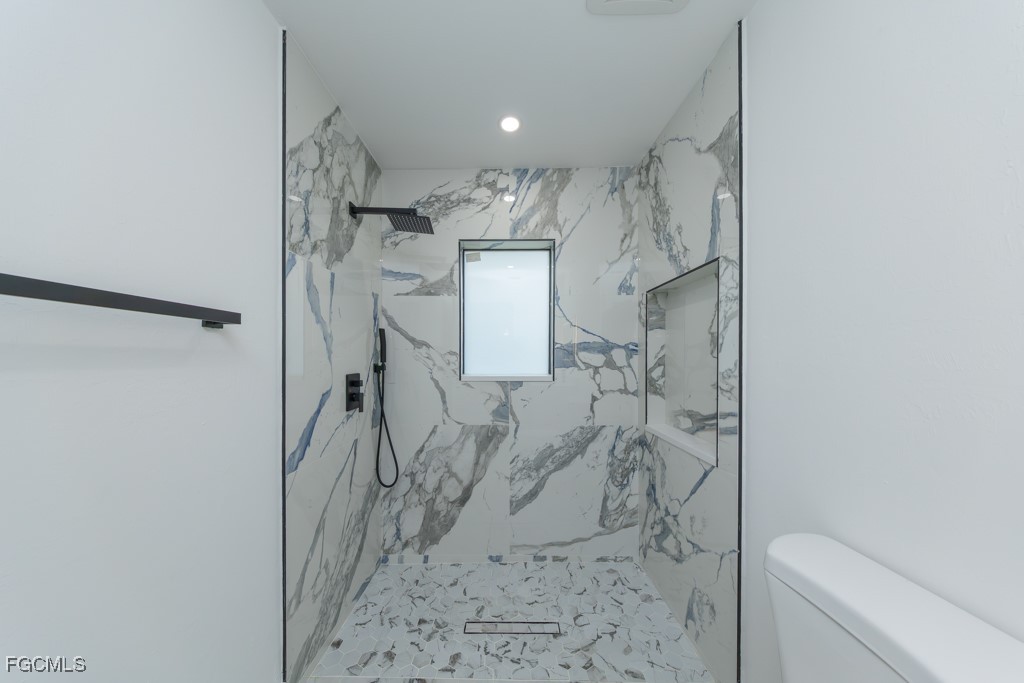 2019 Hamilton Avenue Alva, FL 33920 - Photo 19 of 50 a bathroom with a shower and toilet