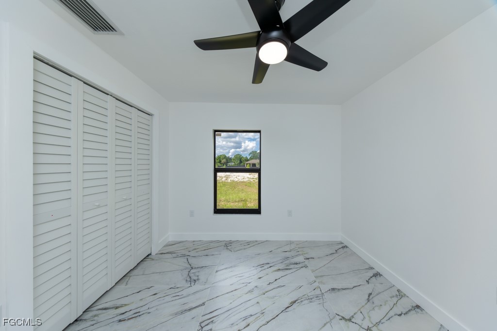 2019 Hamilton Avenue Alva, FL 33920 - Photo 25 of 50 an empty room with a window and a fan