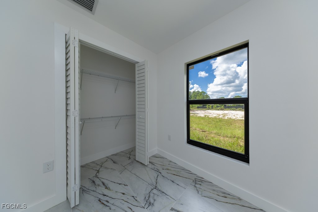 2019 Hamilton Avenue Alva, FL 33920 - Photo 28 of 50 a view of an empty room and window