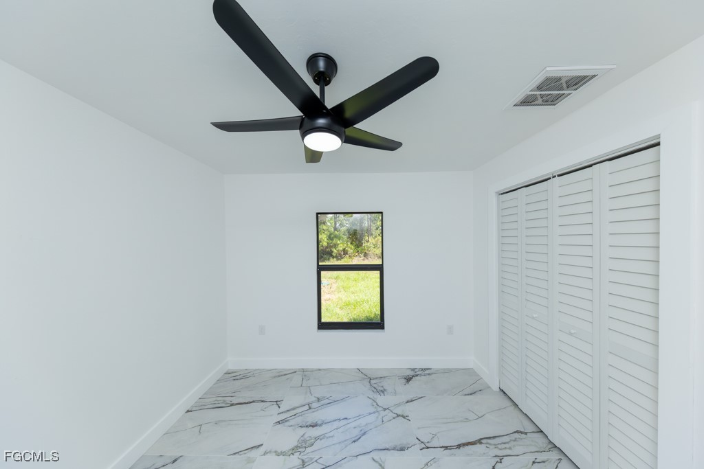 2019 Hamilton Avenue Alva, FL 33920 - Photo 30 of 50 an empty room with windows