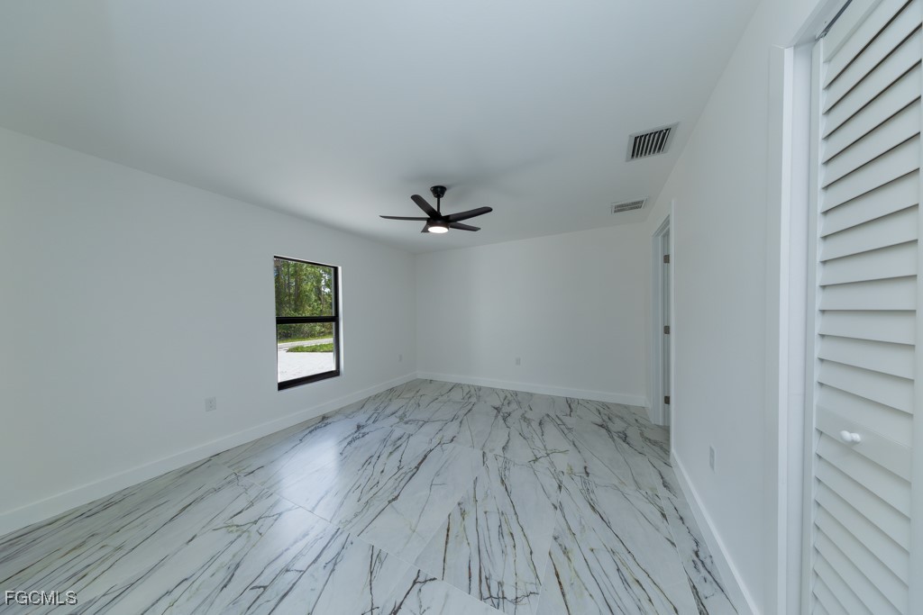 2019 Hamilton Avenue Alva, FL 33920 - Photo 34 of 50 wooden floor in an empty room with a window
