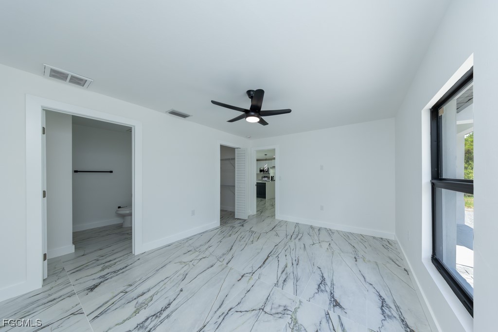 2019 Hamilton Avenue Alva, FL 33920 - Photo 38 of 50 wooden floor in an empty room with a window