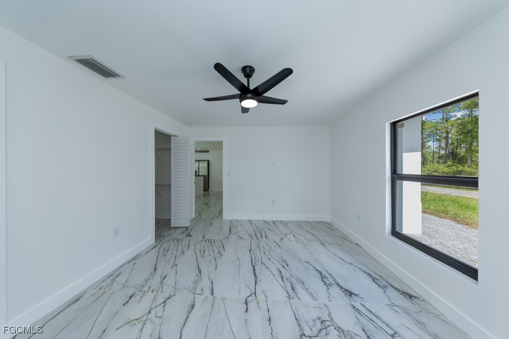 2019 Hamilton Avenue Alva, FL 33920 - Photo 39 of 50 wooden floor in an empty room with a window