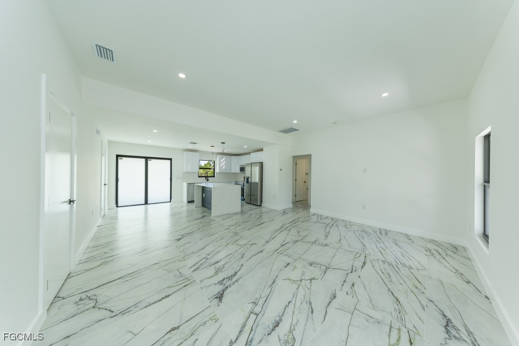 2019 Hamilton Avenue Alva, FL 33920 - Photo 4 of 50 a view of empty room with wooden floor