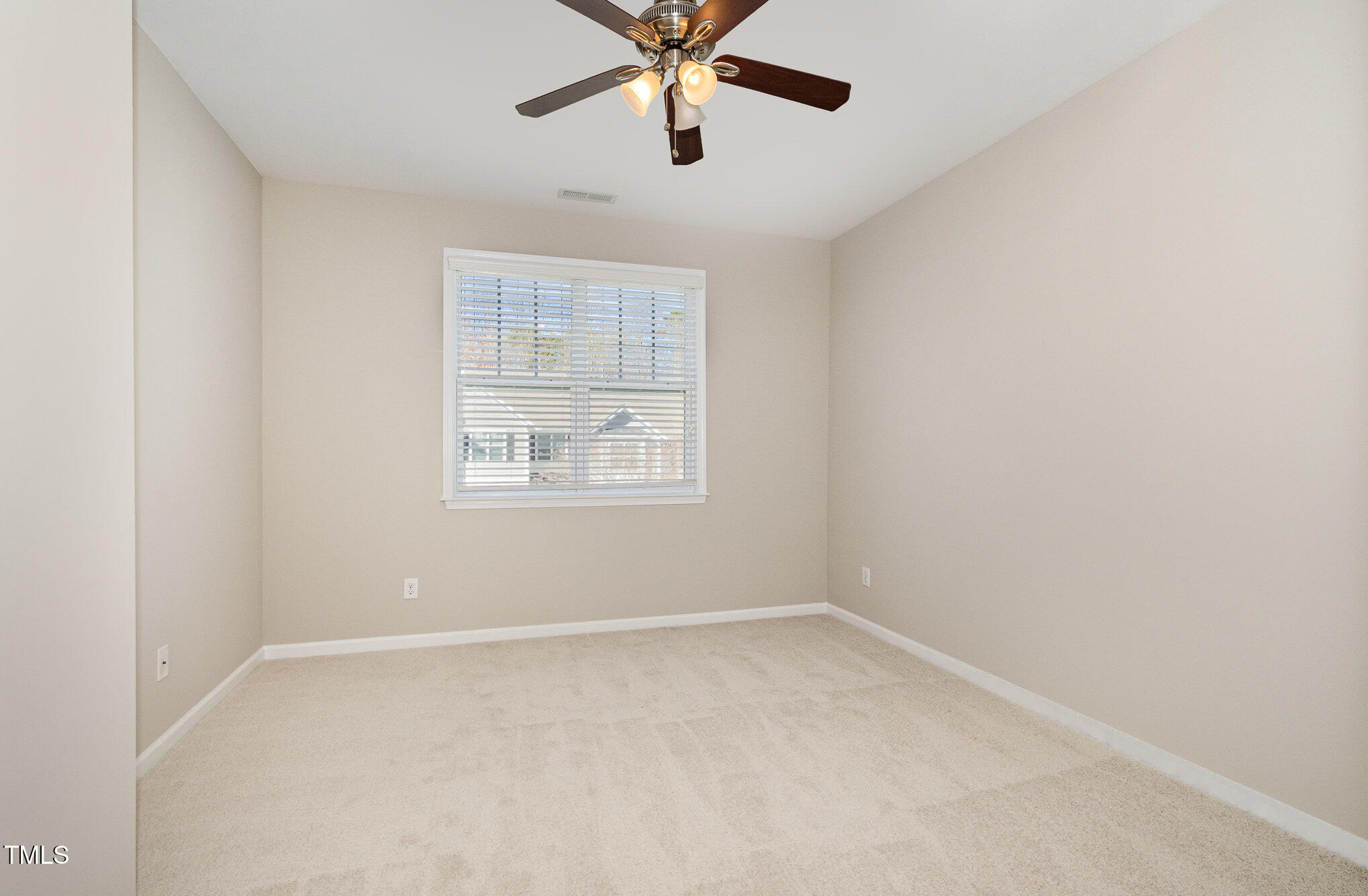 7213 Terregles Drive Raleigh, NC 27617 - Photo 16 of 24 Second Bedroom