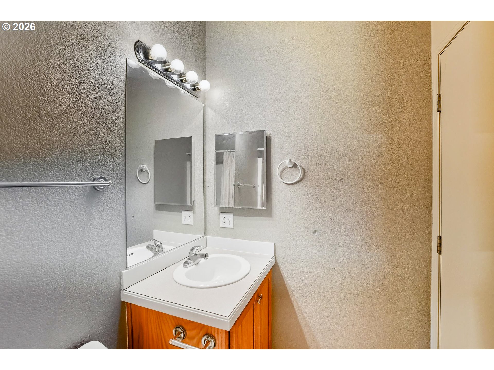 25368 East Cedar Glen Loop Welches, OR 97067 - Photo 15 of 25 a bathroom with a sink and a mirror
