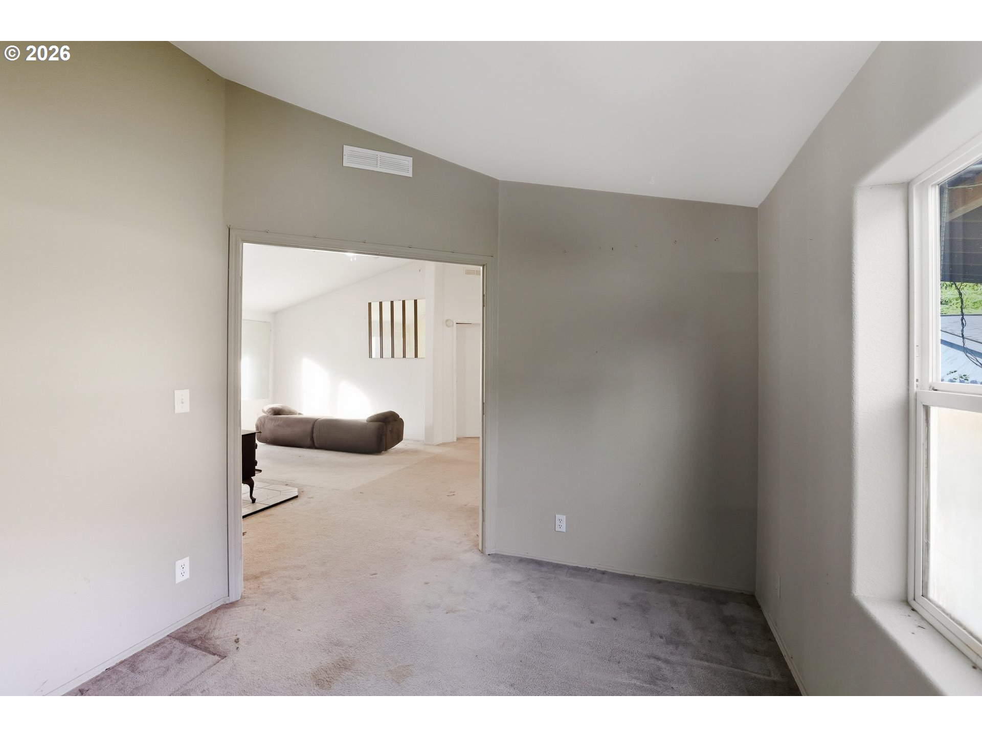 25368 East Cedar Glen Loop Welches, OR 97067 - Photo 17 of 25 a view of a hallway to a livingroom with furniture
