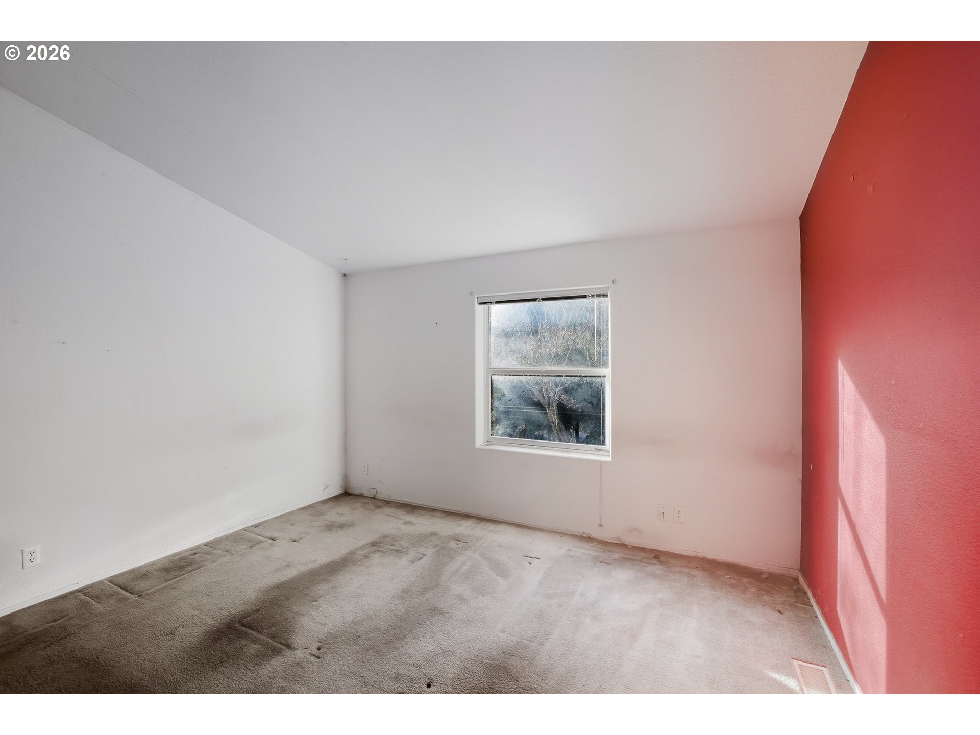 25368 East Cedar Glen Loop Welches, OR 97067 - Photo 19 of 25 a view of an empty room with a window
