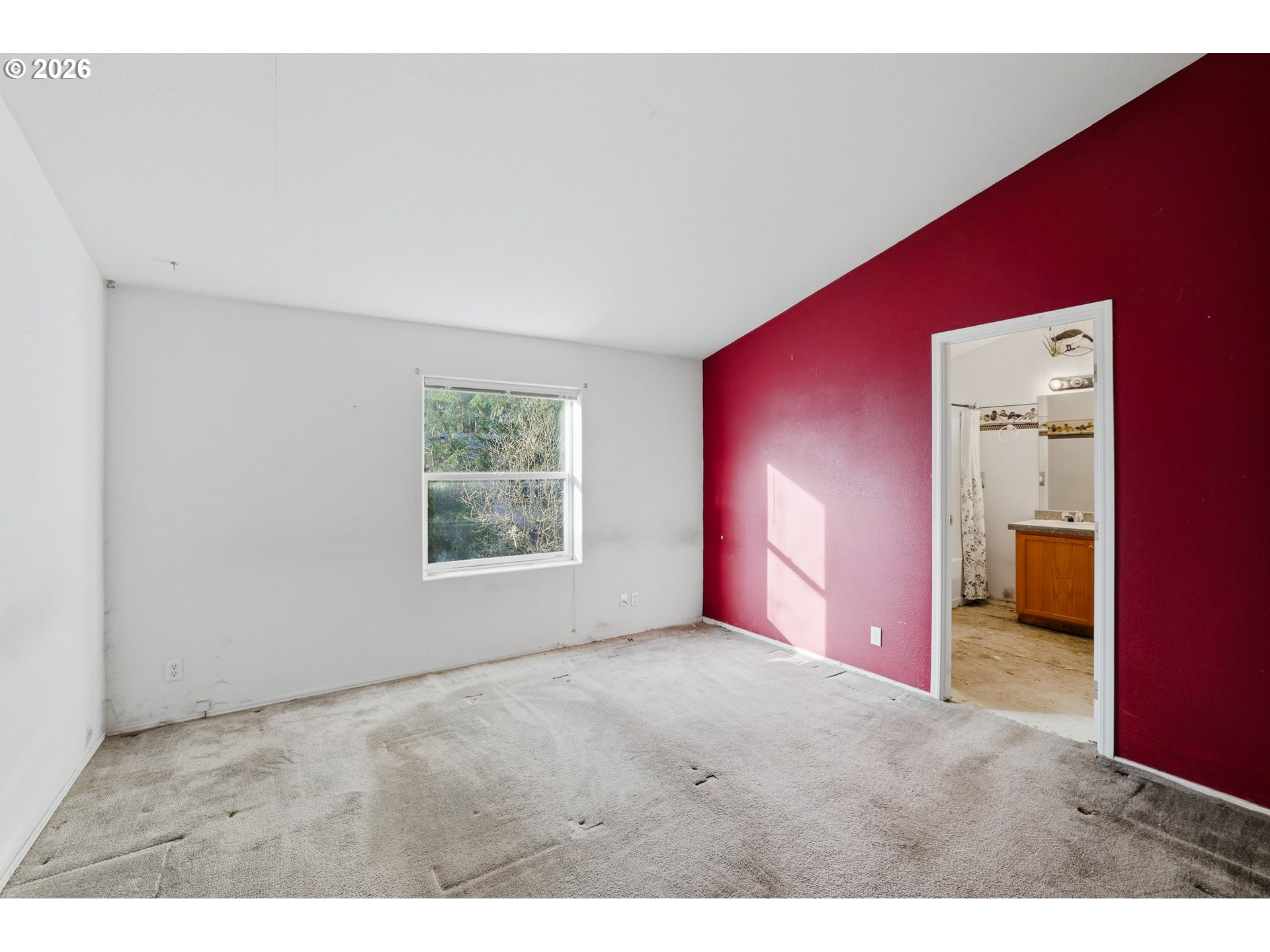 25368 East Cedar Glen Loop Welches, OR 97067 - Photo 20 of 25 a view of an empty room with a window