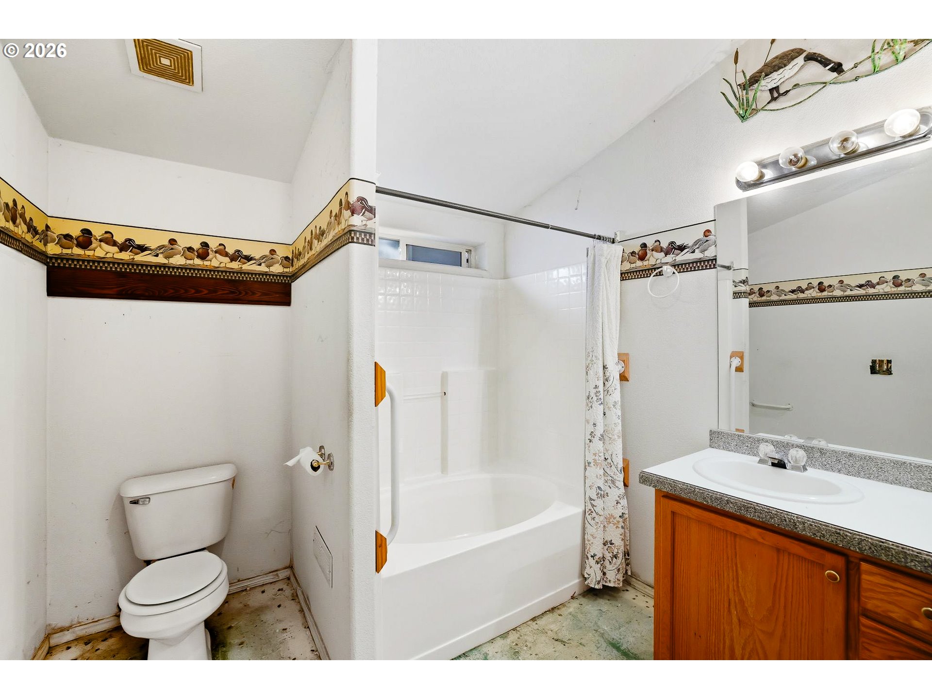 25368 East Cedar Glen Loop Welches, OR 97067 - Photo 22 of 25 a bathroom with a sink mirror toilet and shower
