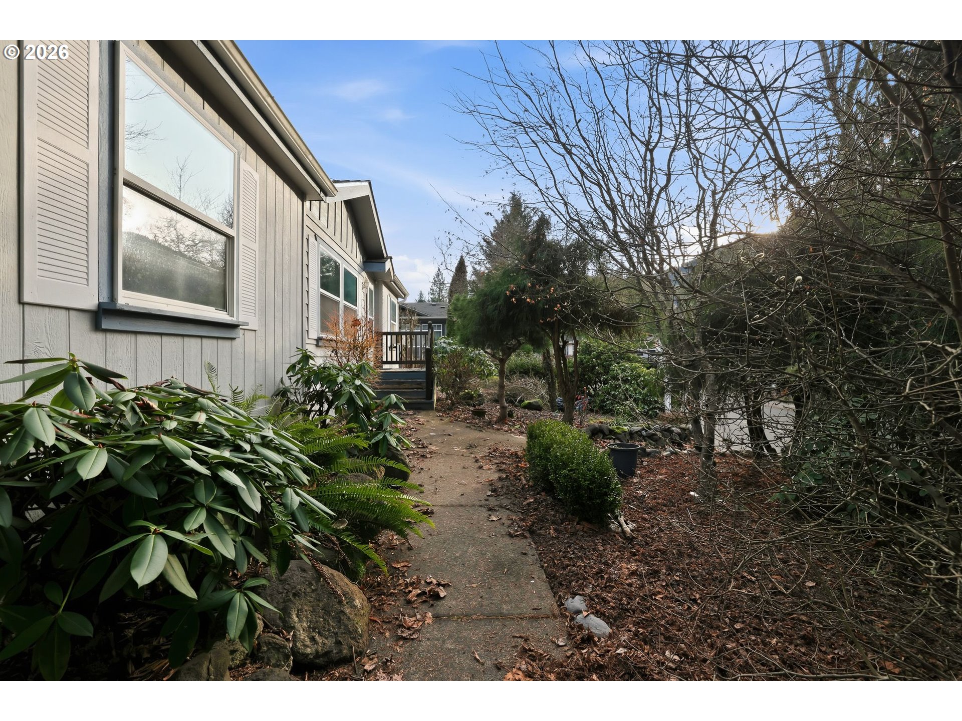 25368 East Cedar Glen Loop Welches, OR 97067 - Photo 4 of 25 a backyard of a house with lots of green space
