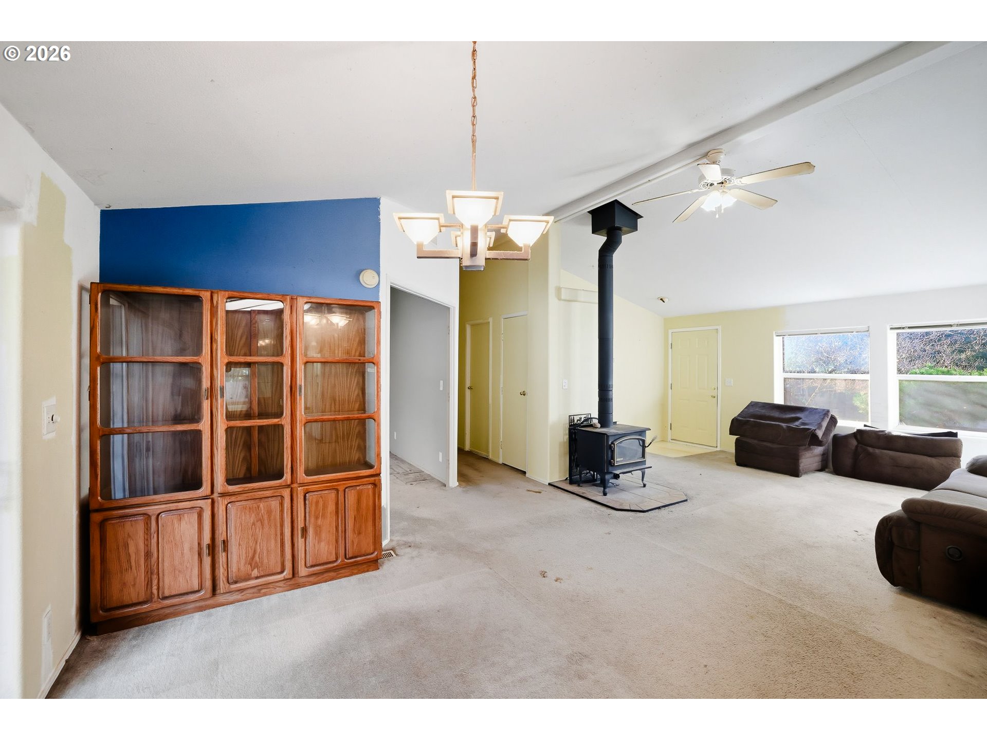 25368 East Cedar Glen Loop Welches, OR 97067 - Photo 9 of 25 a bedroom with furniture and large windows