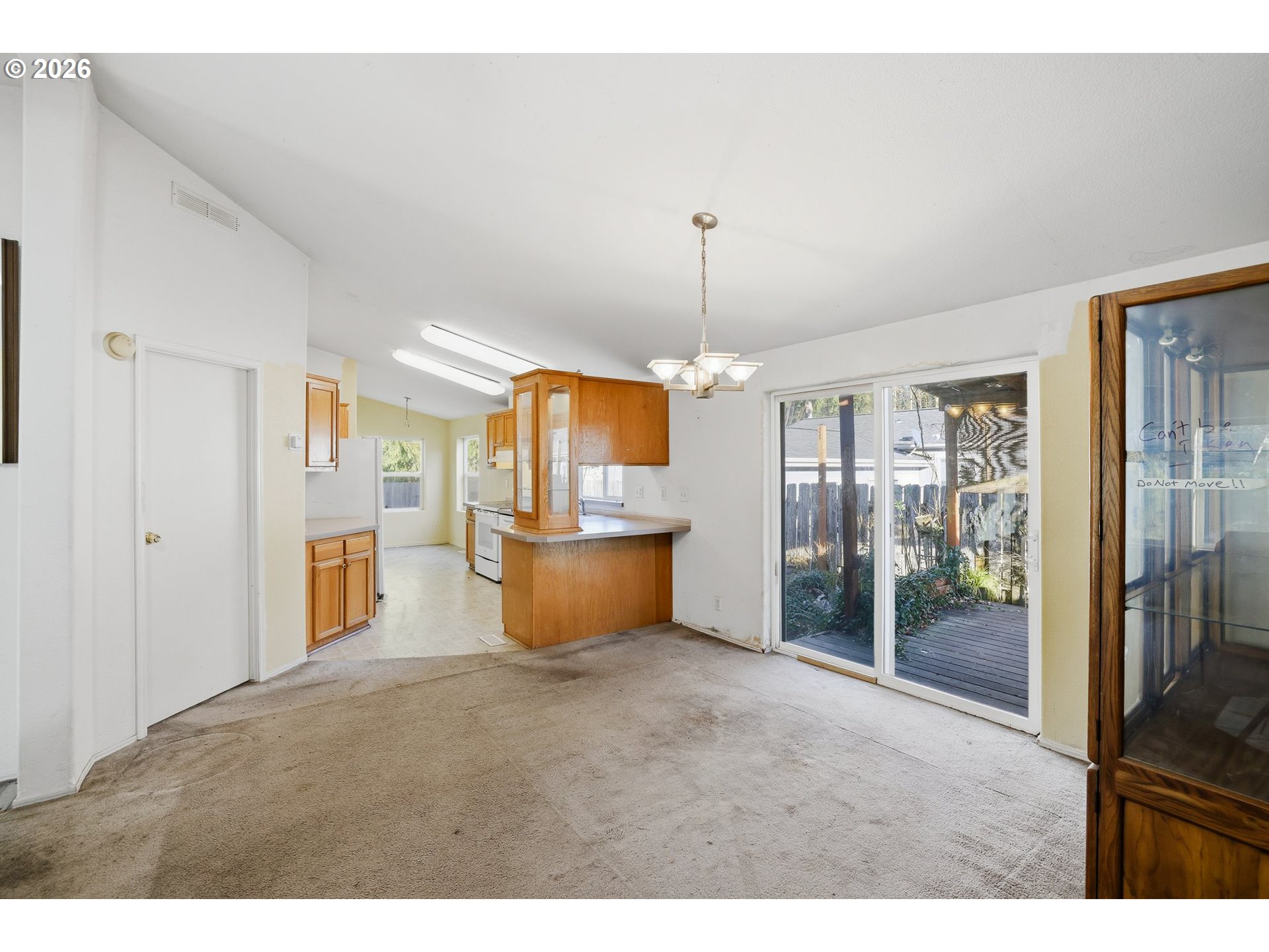 25368 East Cedar Glen Loop Welches, OR 97067 - Photo 10 of 25 a view of a kitchen with a refrigerator